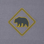 Bear Crossing Sign (Silicone) - Flexfit® Mesh Trucker Cap Color: Coyote/Black - Eternal Glyph LLC