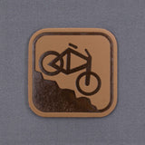 Mountain Bike Downhill (Leather) - Flexfit® Mesh Trucker Cap Color: Coyote/Black - Eternal Glyph LLC