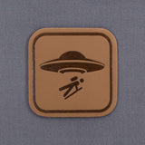 UFO Area Trail Sign (Leather) - Flexfit® Mesh Trucker Cap Color: Coyote/Black - Eternal Glyph LLC