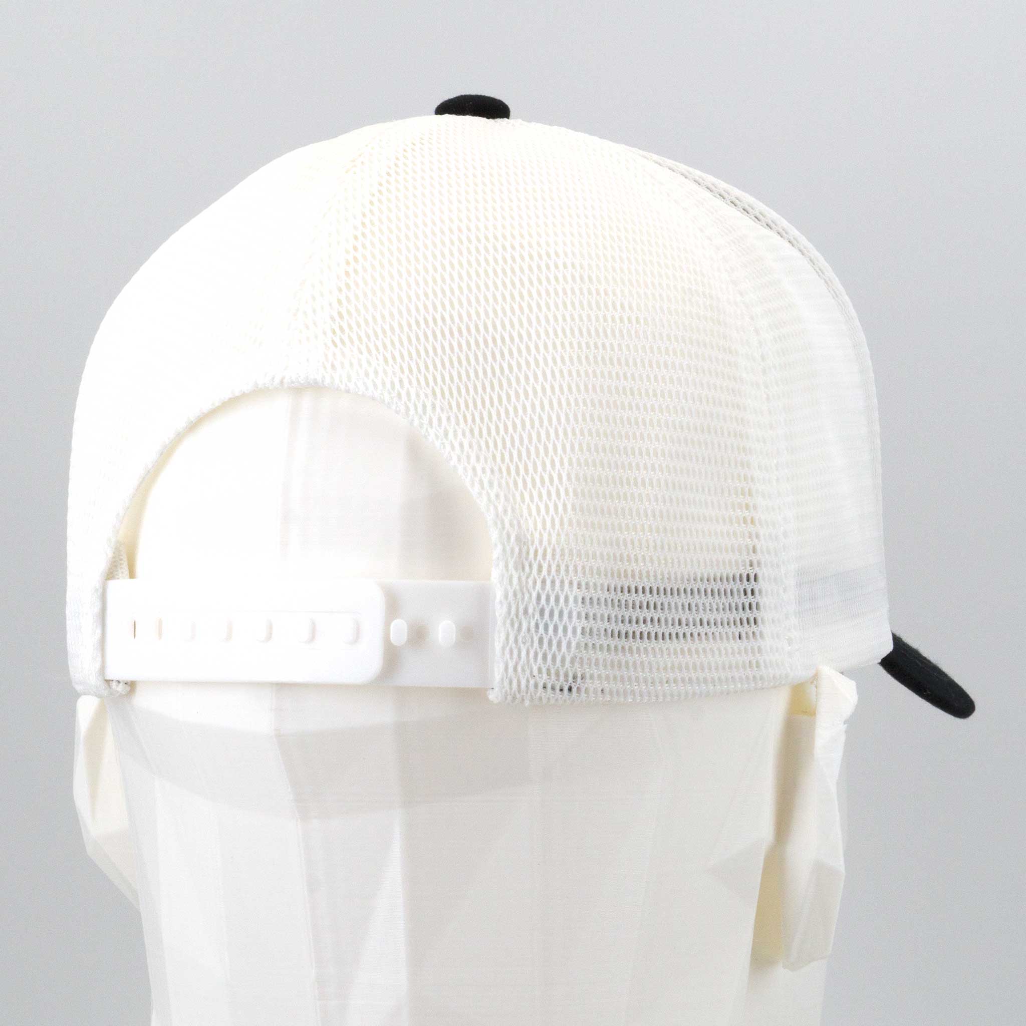 The Eternal Glyph Hiker Trail Sign (Silicone) Flexfit® Mesh Trucker Cap features a white mesh back with adjustable snapback closure and a black front panel—perfect for adventure jewelry fans or anyone who loves hiker symbols.