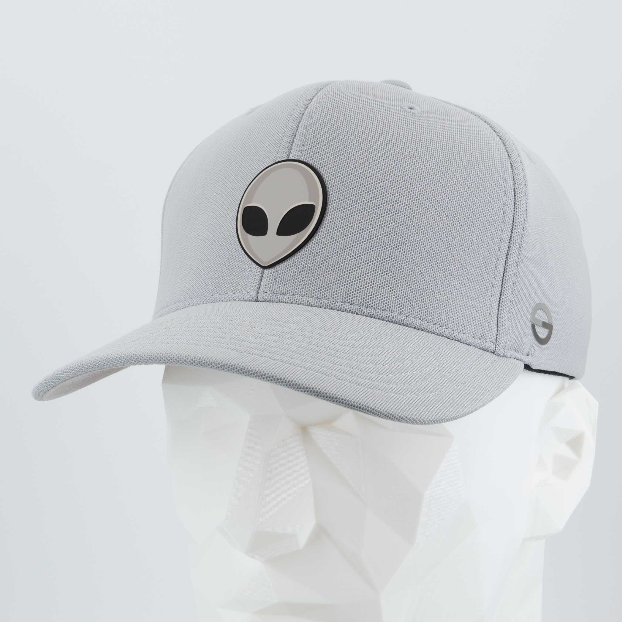 The Alien Gray (Double Layer Silicone) Flexfit® Cool & Dry Cap by Eternal Glyph, featuring a black and gray alien head logo, is displayed on a white faceted mannequin head.