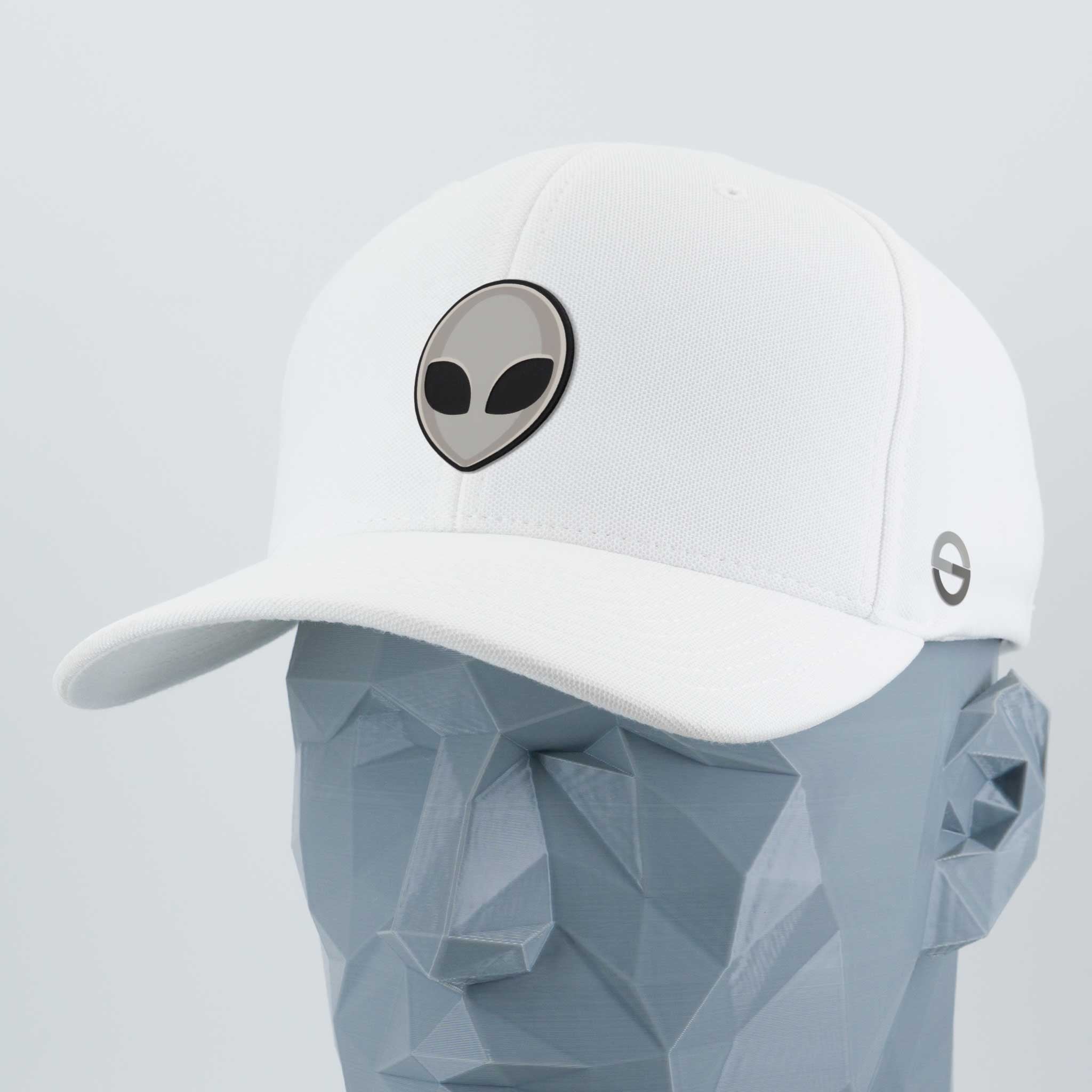 The Alien Gray (Double Layer Silicone) - Flexfit® Cool & Dry Cap by Eternal Glyph is a white baseball cap with a black and gray alien glyph logo on the front, shown on a faceted gray mannequin head.