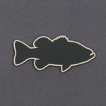 The Eternal Glyph Large Mouth Bass (Silicone) Flexfit® Flat Bill Premium Fitted Cap features a sleek black bass design with a cream outline—an ideal hat for freshwater fishing enthusiasts.