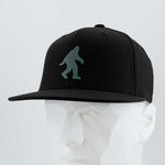 Bigfoot Silhouette (Silicone) - Flexfit® Premium Fitted Cap Color: Black - Eternal Glyph LLC