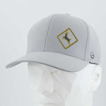 The Eternal Glyph Deer Crossing Sign (Silicone) - Flexfit® Cool & Dry Cap features a light gray design with a yellow-outlined deer logo in a diamond shape on the front, shown on a white geometric mannequin head.