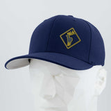 The Elk Crossing Sign (Silicone) - Flexfit® Premium Wool Blend Cap by Eternal Glyph features a navy blue design with a yellow elk emblem, making it ideal for fans of elk symbolism and stylish, nature-inspired accessories.