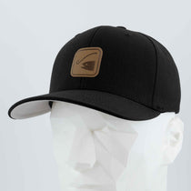 The Eternal Glyph Fishing Trail Sign (Leather) Flexfit® Premium Wool Blend Cap is a black hat with a brown leather patch featuring a minimalist fishing symbol, displayed on a white faceted mannequin head against a plain light background.