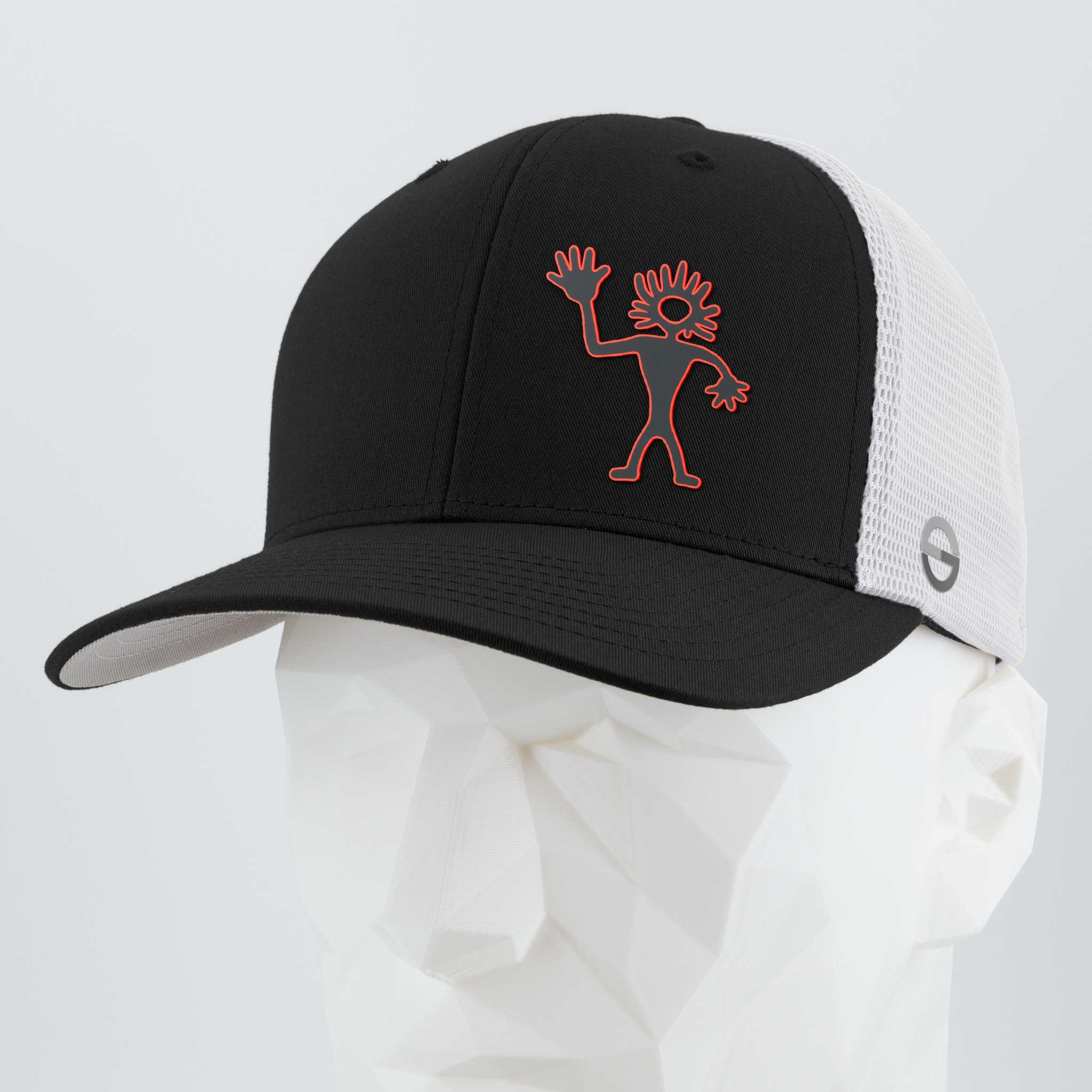 The Eternal Glyph Friendly Man Petroglyph (Silicone) Flexfit® Mesh Trucker Cap is a black and white hat featuring a red stick-figure design inspired by Moab Utah petroglyphs, shown on a white geometric mannequin head.