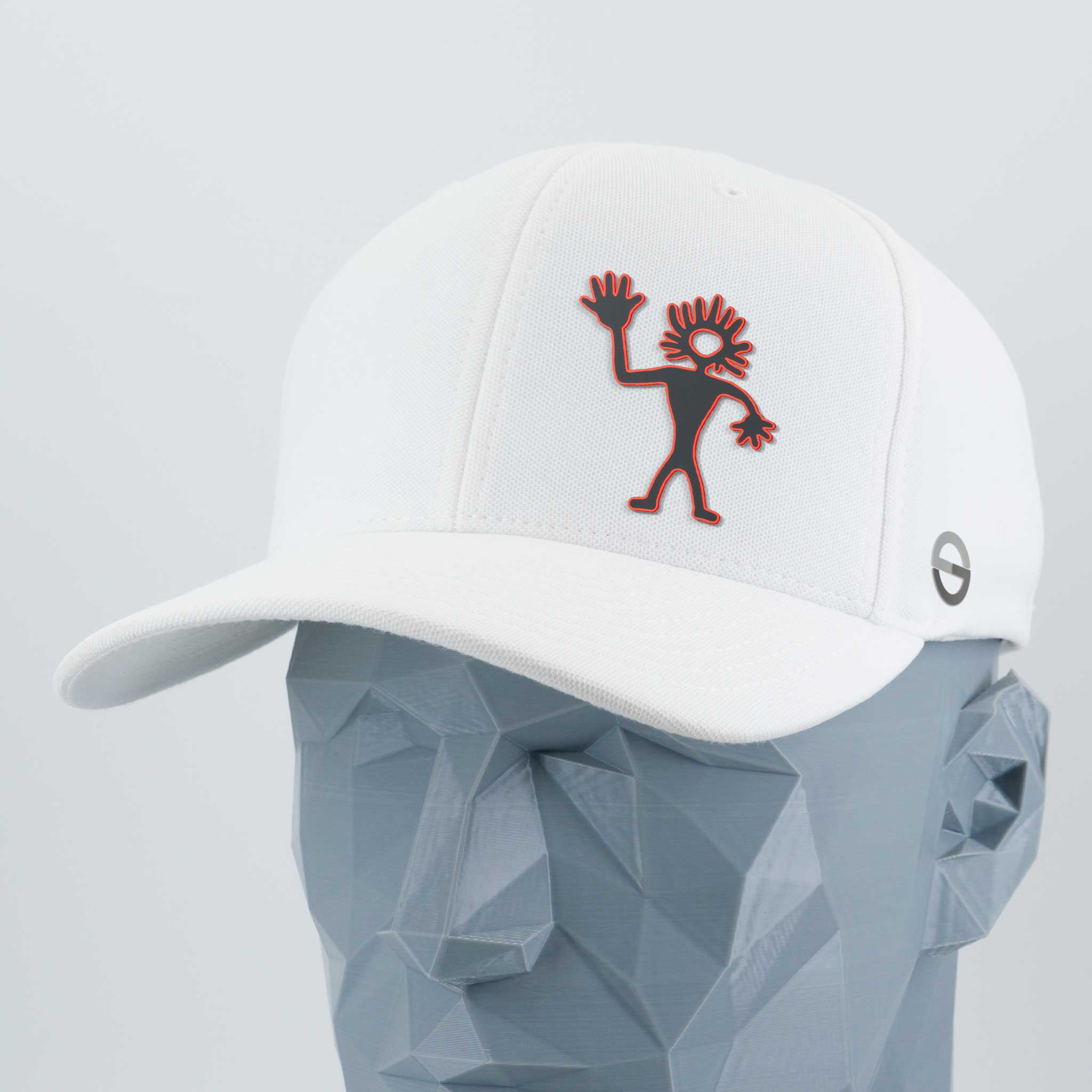 The Eternal Glyph Friendly Man Petroglyph (Silicone) Flexfit® Cool & Dry Cap in white features a red stick-figure logo inspired by the petroglyph on the front and a circular side logo, shown on a geometric gray mannequin head.