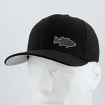 The Eternal Glyph Large Mouth Bass Fishing (Silicone) Flexfit® Premium Wool Blend Cap, in black with a bass-shaped patch on the front, is shown on a white geometric mannequin against a plain light background.