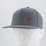 The Eternal Glyph Moab Man Petroglyph (Silicone) Flexfit® Flat Bill Premium Fitted Cap in dark gray features a red line drawing inspired by the Moab Man petroglyph on the front, shown on a white geometric mannequin head.