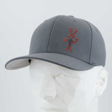 The Eternal Glyph Moab Man Petroglyph (Silicone) Flexfit® Premium Wool Blend Cap in dark gray features an abstract red stick-figure design, inspired by a Utah petroglyph, shown on a faceted white mannequin against a light background.