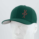 The Eternal Glyph Moab Man Petroglyph (Silicone) Flexfit® Premium Wool Blend Cap in Spruce features a red line drawing on the front and is shown on a white geometric mannequin head against a light gray background.