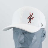 The Eternal Glyph Moab Man Petroglyph (Silicone) Flexfit® Cool & Dry Cap in white features a black and red abstract figure, inspired by ancient petroglyphs, shown on a geometric gray mannequin head.