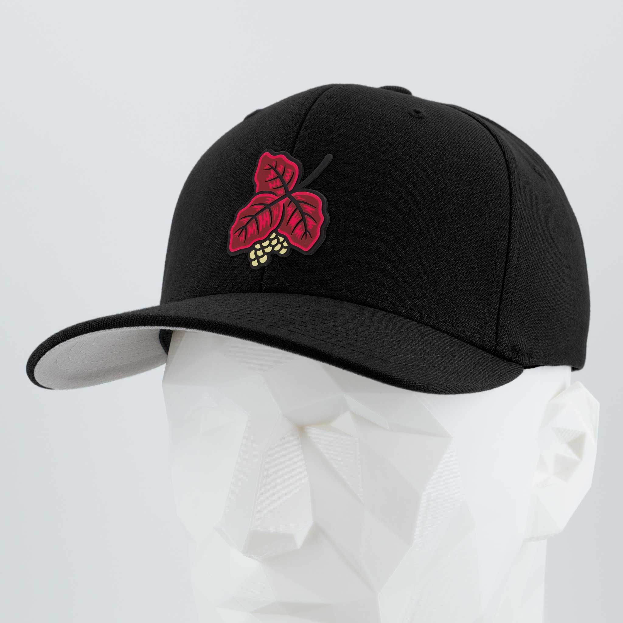The Eternal Glyph Poison Oak (Double Layer Silicone) Flexfit® Premium Wool Blend Cap features red leaf and yellow berry embroidery on a black cap, inspired by poison oak—perfect trailwise style for the outdoorsy.