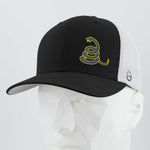 The Eternal Glyph Coiled Rattlesnake Silhouette (Silicone) Flexfit® Mesh Trucker Cap features a black and white design with a yellow rattlesnake logo inspired by the Gadsden flag, shown on a white mannequin head.
