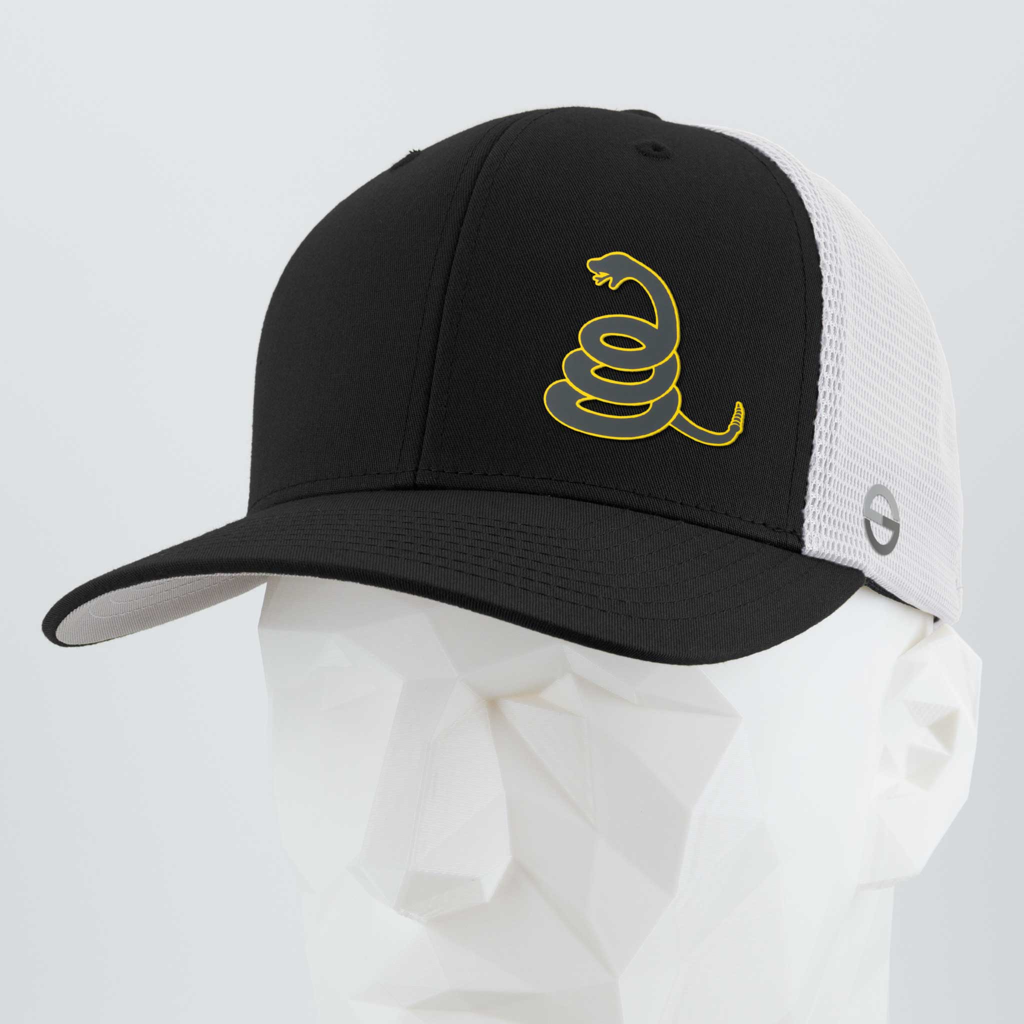 The Eternal Glyph Coiled Rattlesnake Silhouette (Silicone) Flexfit® Mesh Trucker Cap features a black and white design with a yellow rattlesnake logo inspired by the Gadsden flag, shown on a white mannequin head.