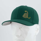 The Eternal Glyph Coiled Rattlesnake Silhouette Flexfit® Premium Wool Blend Cap in dark green, featuring a yellow Gadsden-inspired logo, is shown on a white geometric mannequin head against a light background.