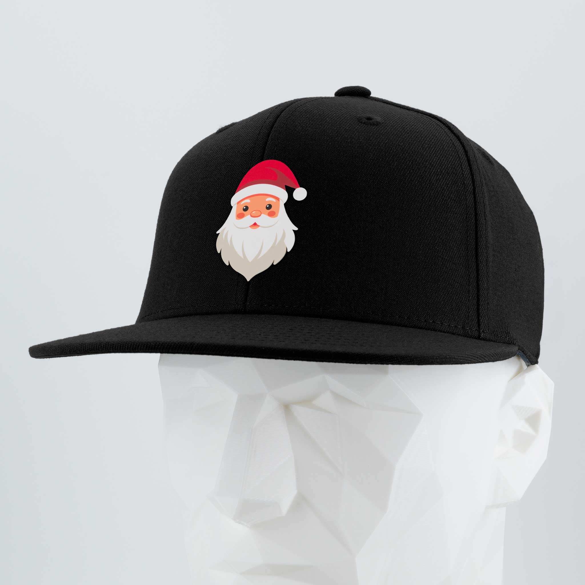 The Eternal Glyph Santa Hat (Silicone) Flexfit® Flat Bill Premium Fitted Cap in black features a simple cartoon Santa glyph—ideal for subtle Christmas style and shown on a white geometric mannequin head.