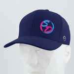 The Staying Driven (Silicone) - Flexfit® Cool & Dry Cap by Eternal Glyph features a colorful SD logo on the front and comes in navy, designed as a motivational accessory for fitness enthusiasts and displayed on a white geometric mannequin head.