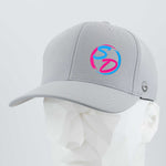 The Eternal Glyph Staying Driven (Silicone) - Flexfit® Cool & Dry Cap in silver features a vibrant 3D silicone logo in pink and blue on the front, making it an ideal accessory for fitness crews eager to stand out. Displayed on a white geometric mannequin head against a plain background.