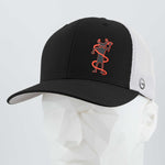 The Eternal Glyph Moab Shaman Petroglyph (Silicone) Flexfit® Mesh Trucker Cap features a black and white design with an abstract orange stick figure, displayed on a white geometric mannequin head.