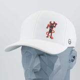 The Eternal Glyph Moab Shaman Petroglyph (Silicone) Flexfit® Cool & Dry Cap in white features a red and black stylized shaman logo inspired by the Moab petroglyph on the front, plus a small circular emblem on the side, shown on a gray mannequin head.