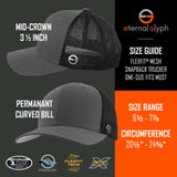 Two black and gray Flexfit® Mesh Trucker Caps by Eternal Glyph, featuring the Hiker Trail Sign (Silicone) logo. With a mid-crown 3-inch profile and permanent curved bill, they're adventure-ready and fit most—perfect for trail exploration or everyday wear.