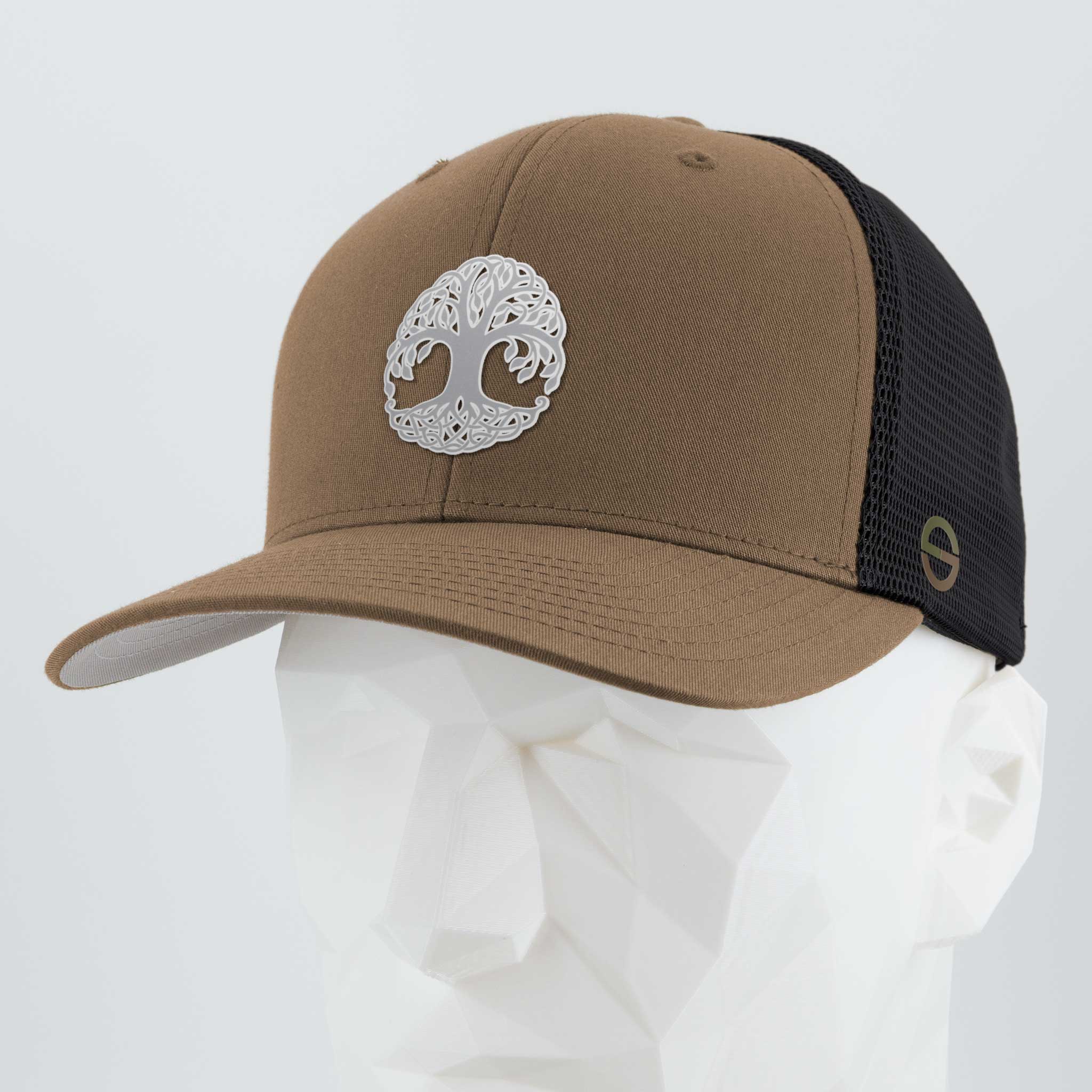 The Eternal Glyph Tree of Life, Yggdrasil, Metallic Silver (Silicone) Flexfit® Mesh Trucker Cap in brown and black is shown on a faceted white mannequin head against a plain background.