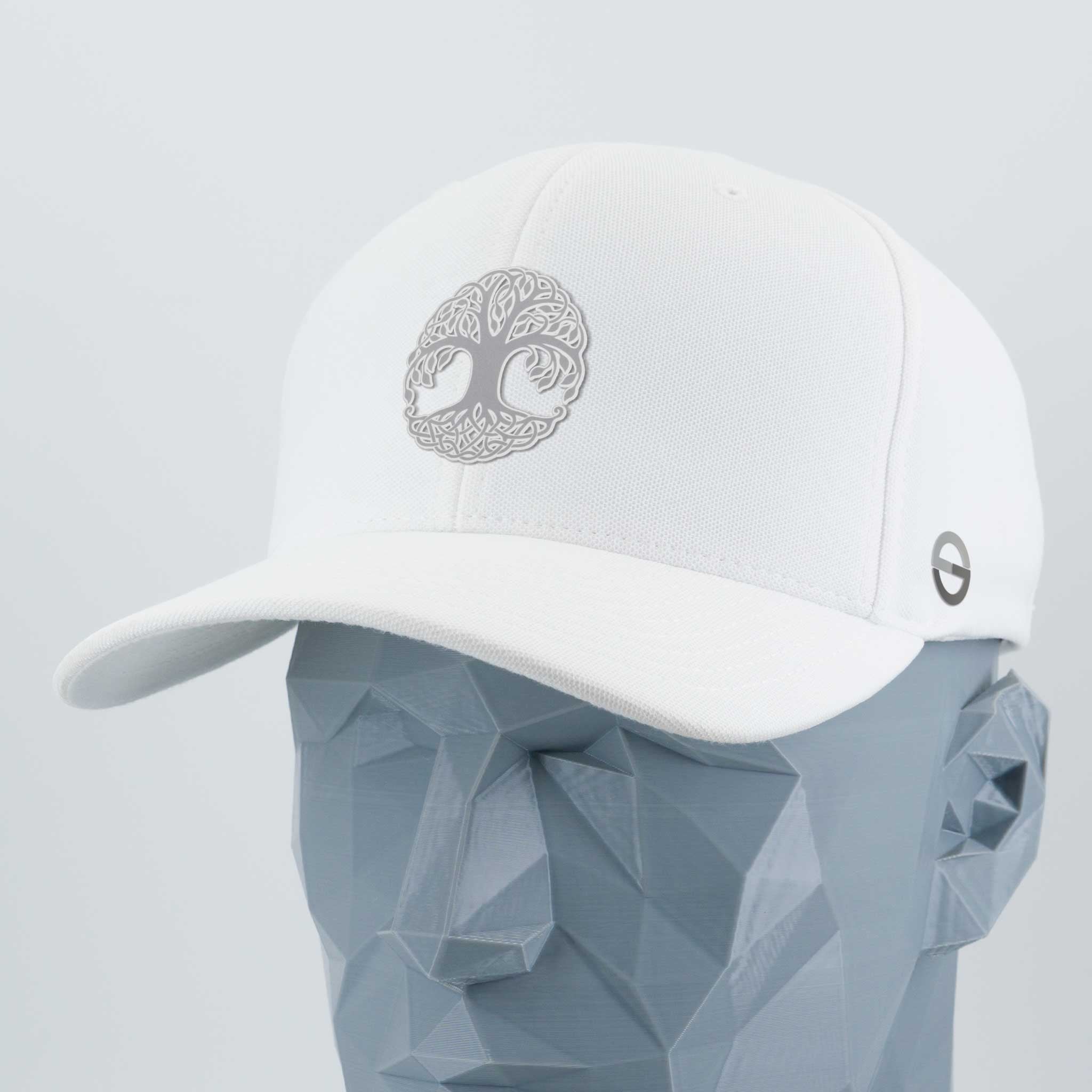 The Eternal Glyph Tree of Life, Yggdrasil, Metallic Silver Flexfit® Cool & Dry Cap features a gray Yggdrasil design on white and a small circular logo on the left side, shown here on a faceted gray mannequin head.