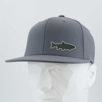 The Eternal Glyph Trout Fishing (Silicone) Flexfit® Flat Bill Premium Fitted Cap is a gray snapback with a trout fishing patch, displayed on a white geometric mannequin head against a plain light background.