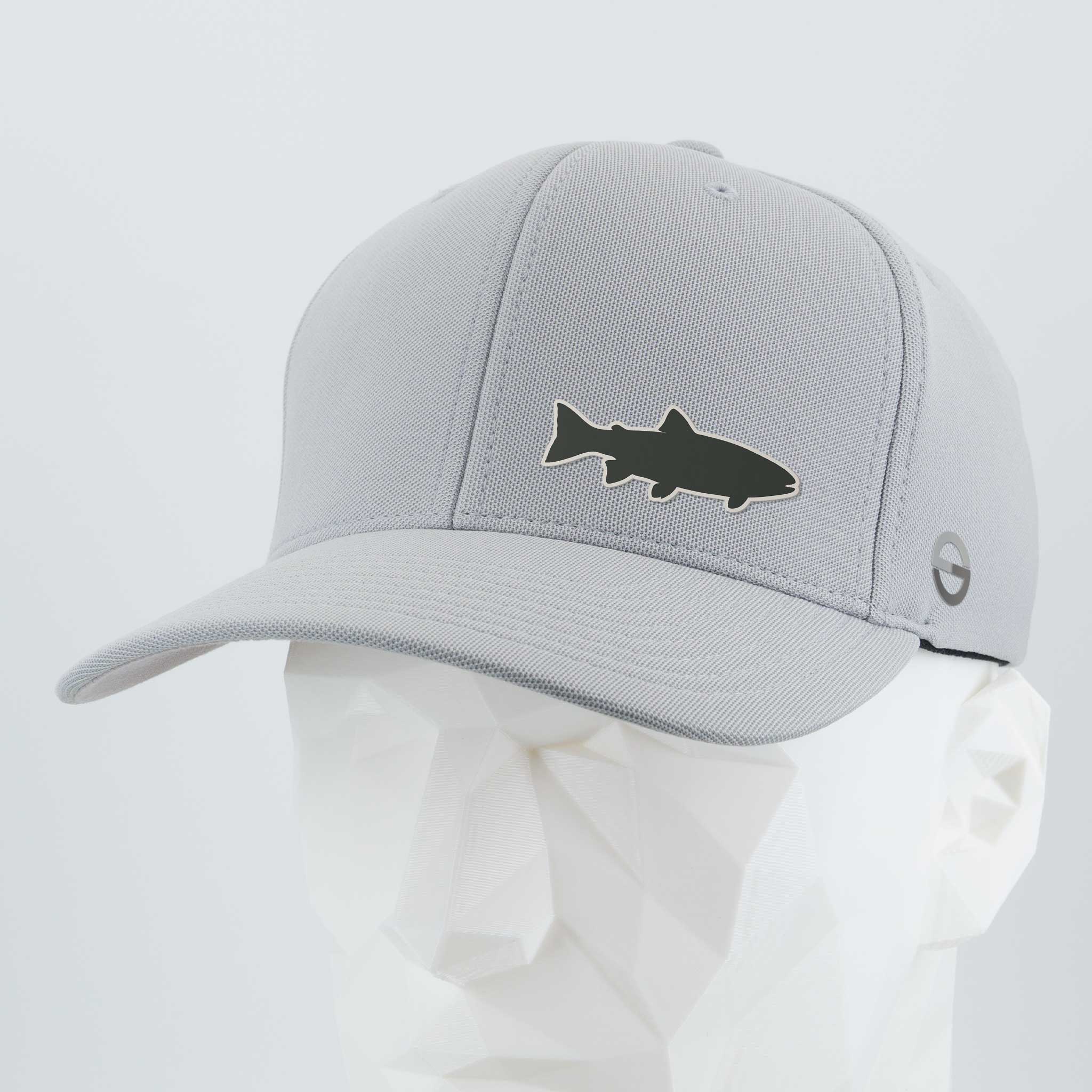 The Eternal Glyph Trout Fishing (Silicone) - Flexfit® Cool & Dry Cap features a light gray design with a dark trout silhouette logo, shown on a white geometric mannequin head—ideal for stylish trout fishing and mountain stream adventures.