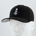 The Eternal Glyph Uncle Sam, I Want You (Silicone) Flexfit® Premium Wool Blend Cap in black features a bold embroidered patch of Uncle Sam and is showcased on a white geometric mannequin head against a light gray background.