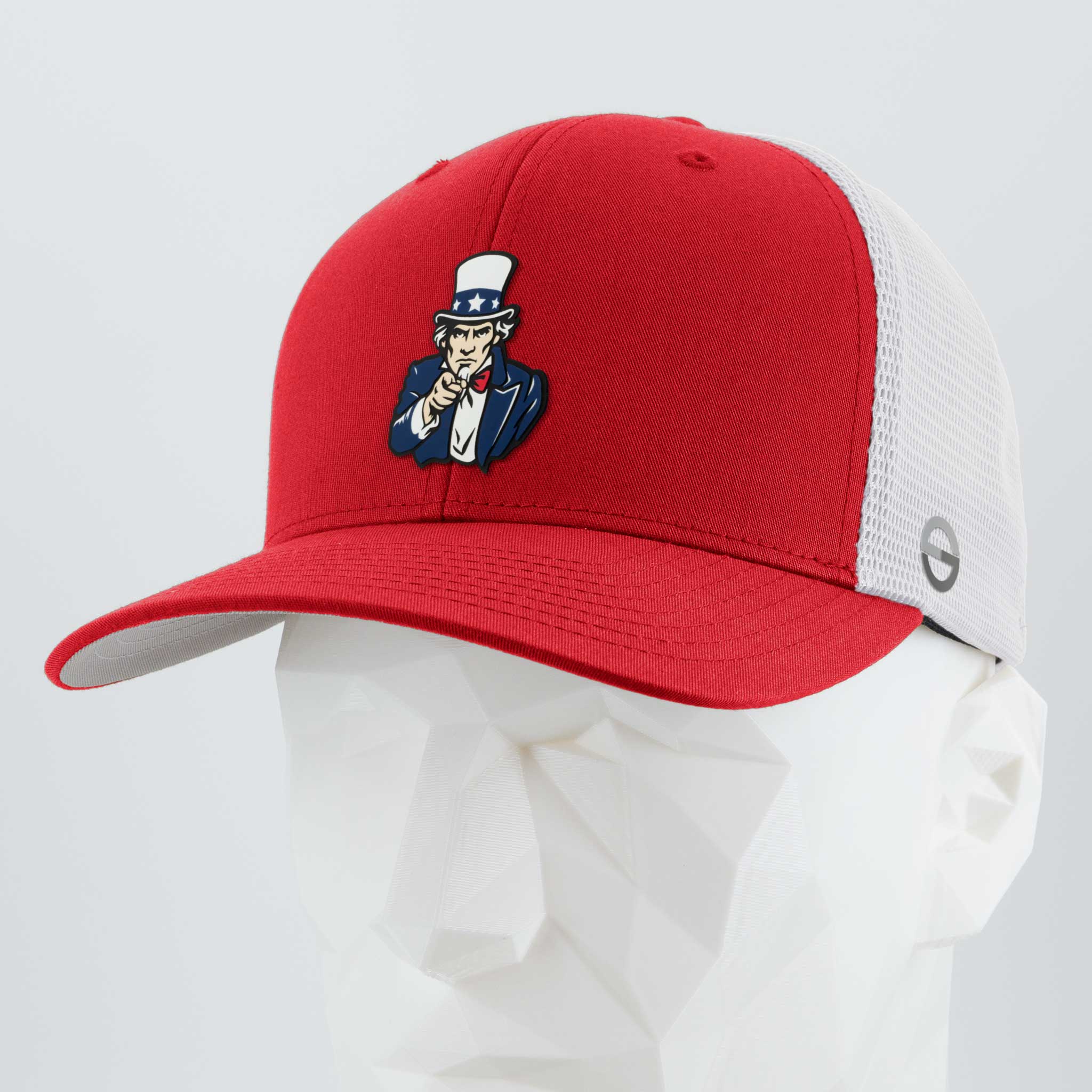 The Eternal Glyph Uncle Sam, I Want You! Flexfit® Mesh Trucker Cap in Red/White features Uncle Sam pointing on the front and is displayed on a white geometric mannequin head against a light gray background.